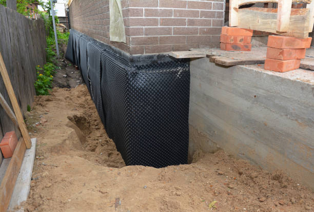 SJ Waterproofing Pros technician performing targeted Waterproofing assessment in Middleville, MI